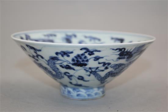 A Chinese blue and white dragon and phoenix bowl, Yongle four character mark to the interior, 15cm.